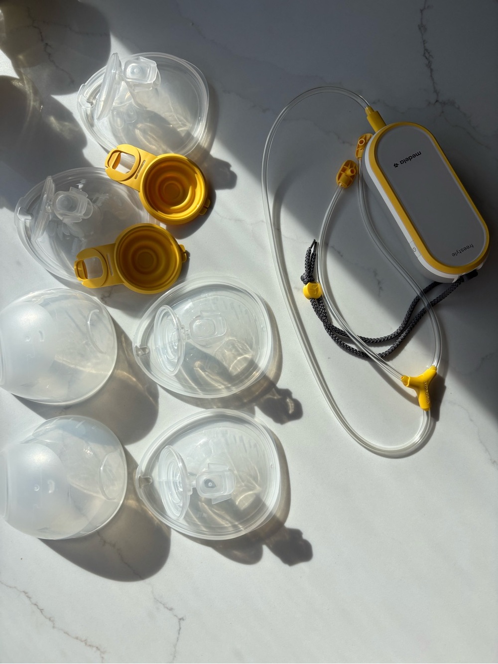 Medela Electric Breast Pump Kit with Yellow Accents and manual pump